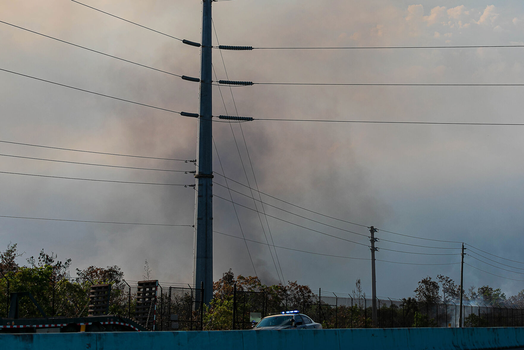 Another of the smoke plumes from the 125 MM fire could be seen west of MM 124 along the Stretch.